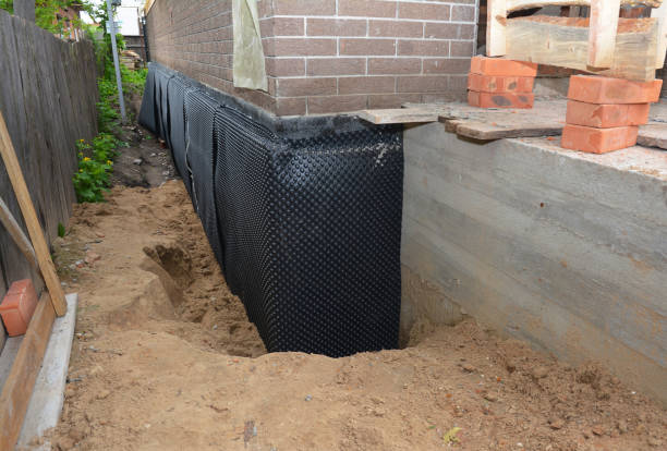 Happy homeowners after waterproofing job in Getzville